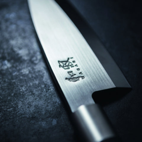 KAI 6715U Кухненски нож универсален Wasabi Black 15 см.